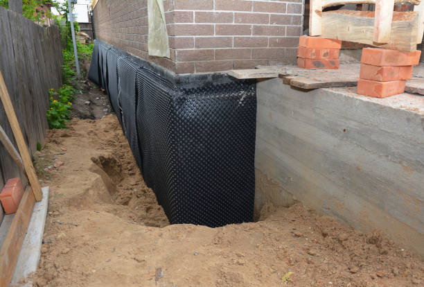 Happy homeowners after waterproofing job in Millersville